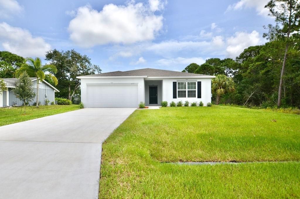 Photo of 1157 SW Irving St, Port Saint Lucie, FL 34983 (MLS # F10298498)