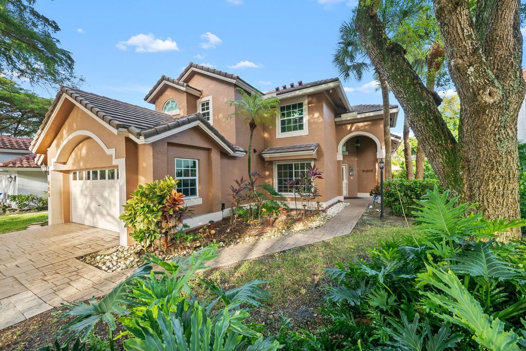 Photo of 608 Misty Oaks Ln, Pompano Beach, FL 33069 (MLS # F10541164)