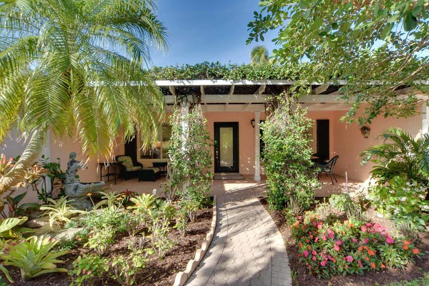 Charming Palm Beach pool house steps to private gated entry to the widest most beautiful beaches on the Island. Front Porch overlooking gorgeous impeccably maintained gardens, beamed sunroom overlooking the pool with spa, outdoor screened patio, and  split floor plan make this classic move in ready Florida home the  perfect North End peaceful Palm Beach bungalow.