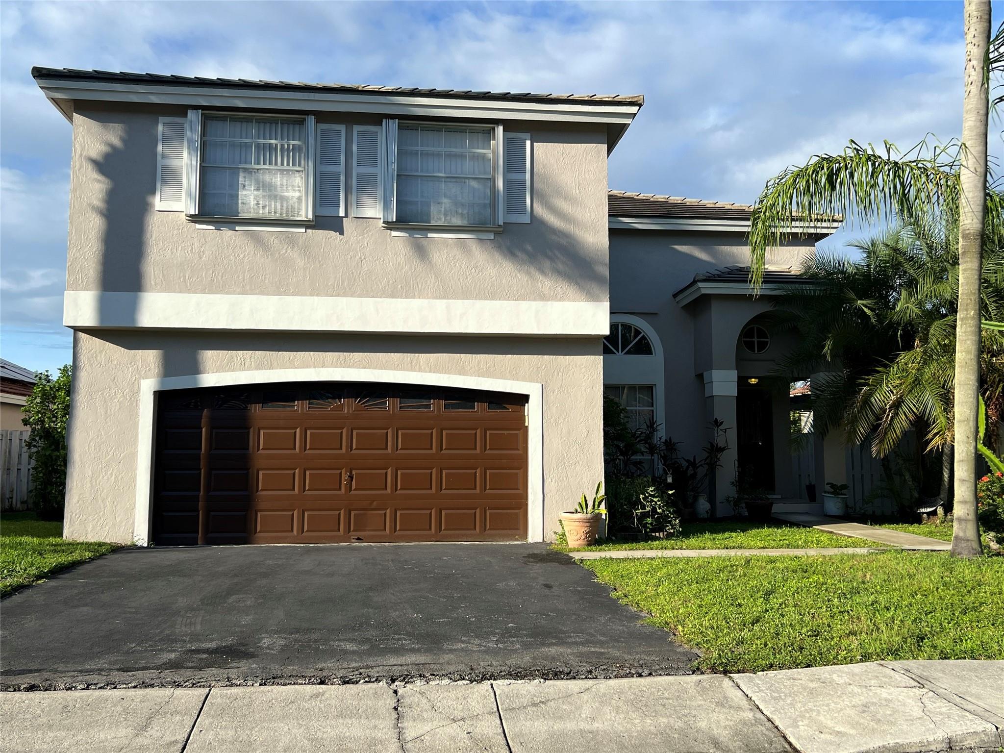 Osprey North Sawgrass Mills development. In law bedrm 1st fl....  Easy Option, 5th bedroom upstairs loft area now is TV office area, has opening for closet just needs the doors & one wall it was a Builder option when purchased. Master bedroom upstairs with lg walk in closet. 1 bedroom downstairs. Private back yard w/ Large Open freeform pool. Spacious Sitting covered area Pergola covered for entertaining outside. Wood cabinets, Black stainless, & Granite kit w/built in wine Frig. Tile floors. ONE OWNER HOME. Move in ready. Near Great Schools, Sawgrass Mills shopping Mall, Major highways, Low HOA $200 per month covers lawn & community maintenance. (some furniture for sale) Home alarm system. Accordion shutters upstairs & panels downstairs. Extra cabinets for storage in garage.