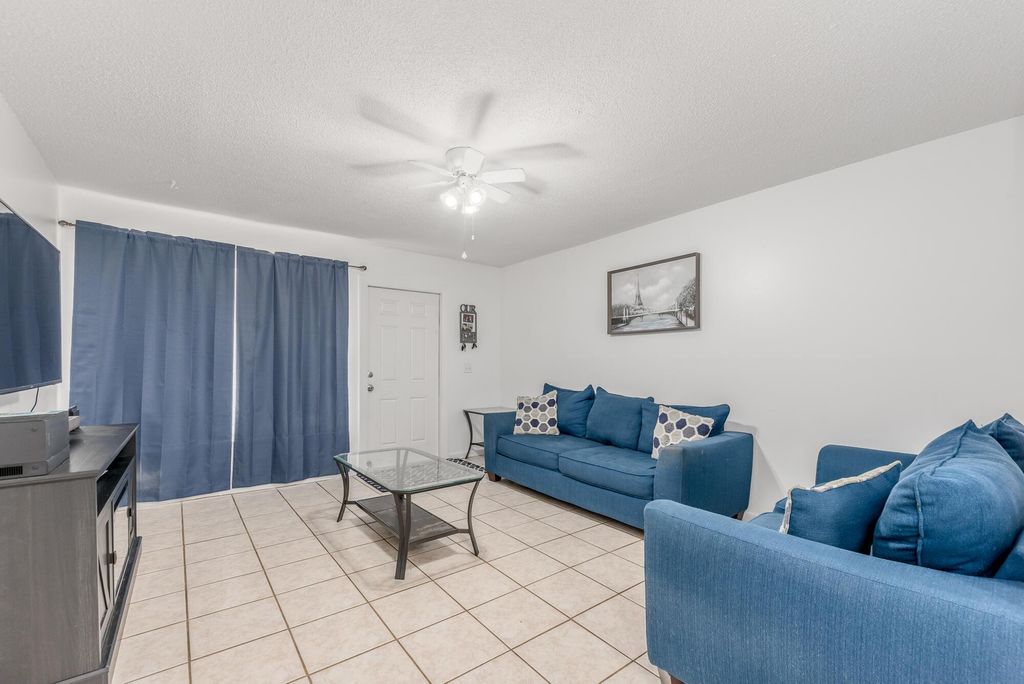 Photo of 3059 SE Amherst Street #3059-3069, Stuart, FL 34997 (MLS # R10982915)