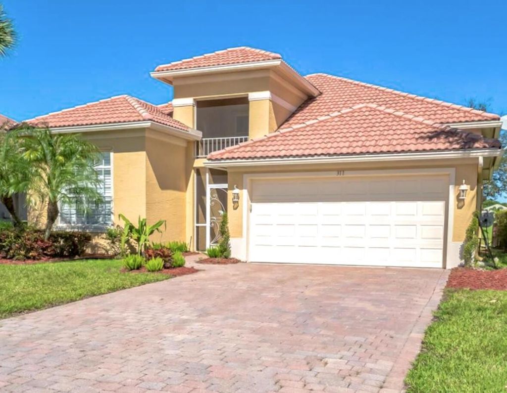 Photo of 311 NW Somerset Circle, Port Saint Lucie, FL 34983 (MLS # R11003005)