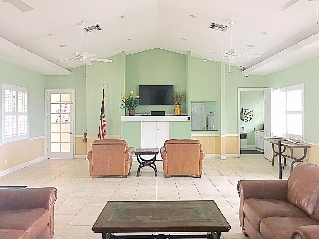 Photo of 311 NW Somerset Circle, Port Saint Lucie, FL 34983 (MLS # R11003005)