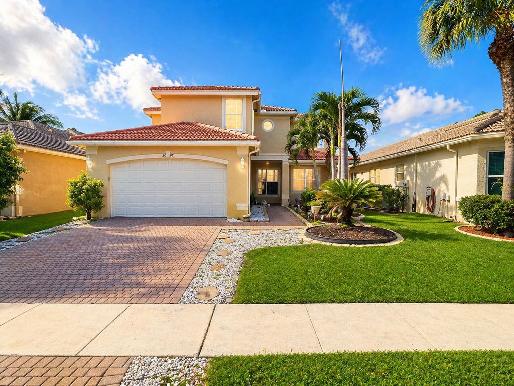 Photo of 5097 Bright Galaxy Lane, Greenacres, FL 33463 (MLS # B26020564)