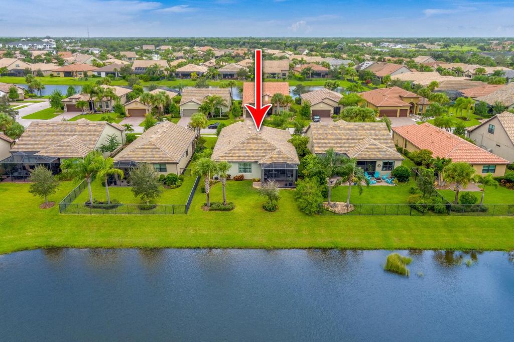 Photo of 221 SE Longview Drive, Port Saint Lucie, FL 34984 (MLS # R10939046)