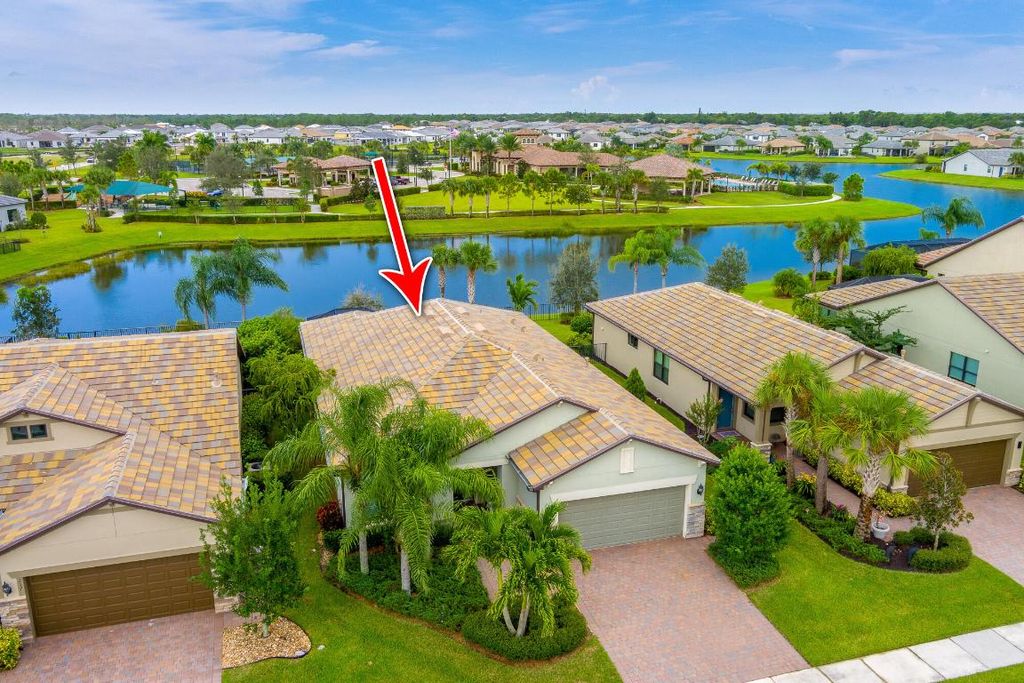 Photo of 221 SE Longview Drive, Port Saint Lucie, FL 34984 (MLS # R10939046)