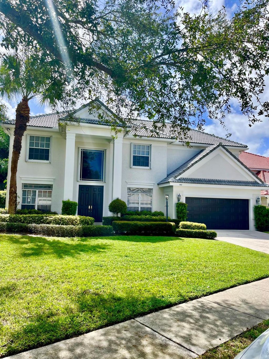 Photo of 182 Satinwood Lane, Palm Beach Gardens, FL 33410 (MLS # R10915800)