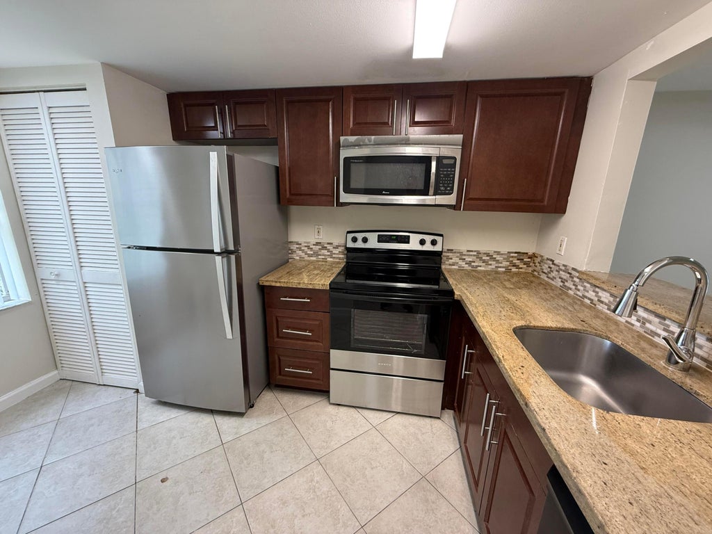 Photo of 3817 NW 90th Avenue, Sunrise, FL 33351 (MLS # B26079276)