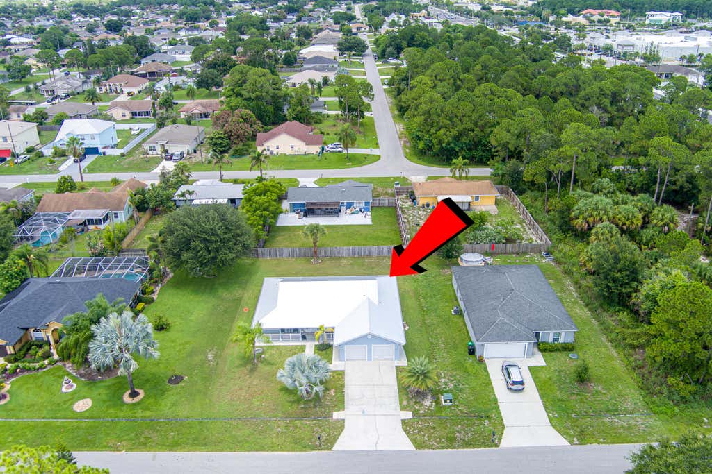 Photo of 937 SW SOUTH GLOBE Avenue, Port Saint Lucie, FL 34953 (MLS # B26053393)