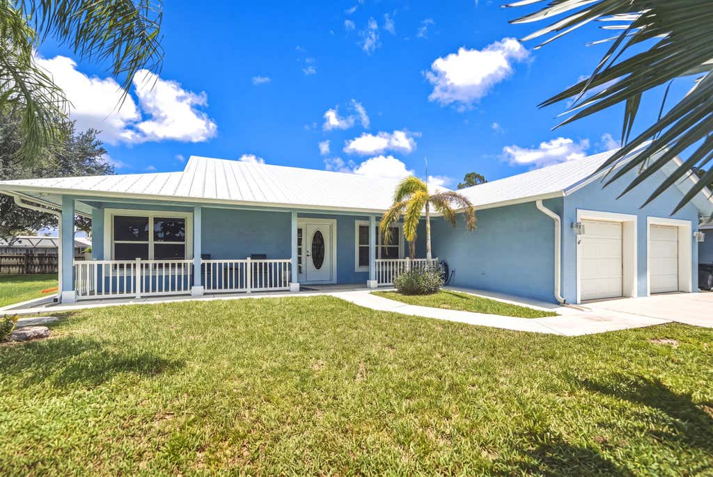 Photo of 937 SW SOUTH GLOBE Avenue, Port Saint Lucie, FL 34953 (MLS # B26053393)