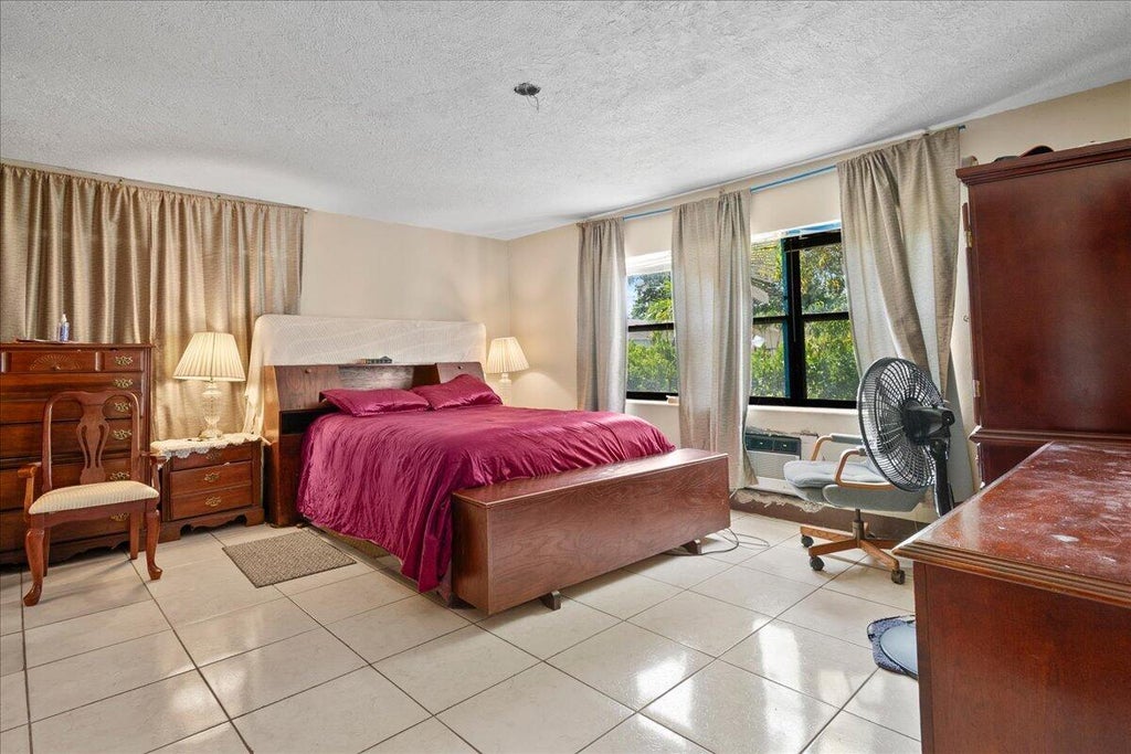 Photo of 1740 11th Avenue N, Lake Worth Beach, FL 33460 (MLS # B26069988)