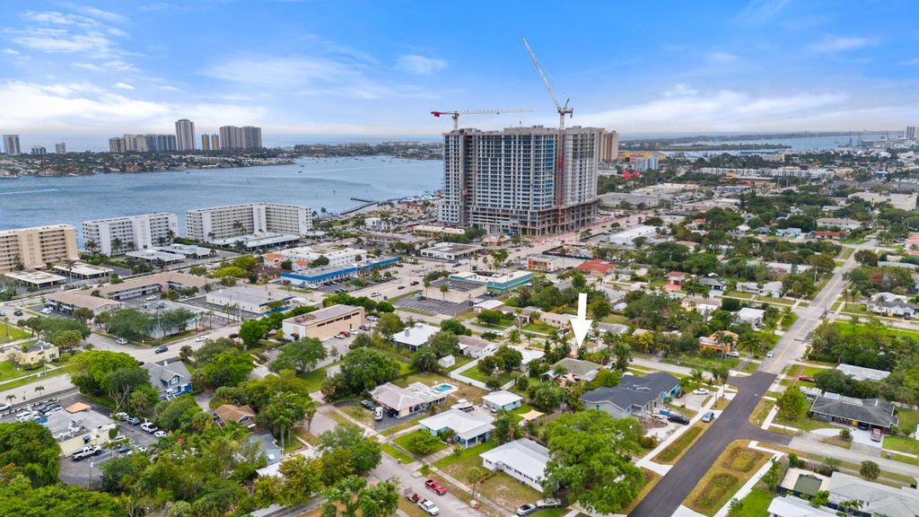 Photo of 139 Evergreen Drive, Lake Park, FL 33403 (MLS # R10975111)