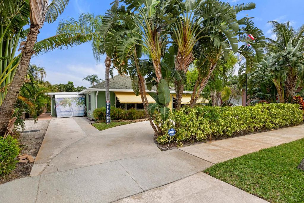 Photo of 139 Evergreen Drive, Lake Park, FL 33403 (MLS # R10975111)