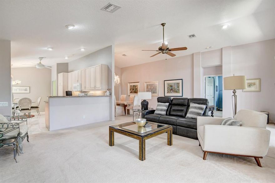 This CUSTOM Cypress III model is move-in ready!  These original owners and builder expanded the floor plan in all the right places. This home has been lovingly maintained and is offered partially furnished for seller's convenience.  The 3rd bedroom off the foyer is now a den/office with no closet.  The expansive primary bedroom suite has room for seating areas, 2 walk-in closets. There is ramp access in garage and wider doorways. A/C 2018, a Generac Generator, accordion storm shutters, panels and workbench in the garage. Amenities include new Fitness Center, Tennis, Pickle-ball, Billiards, clubs galore and so much more. A few mins from nature preserves/wetlands, 15 mins. from beach, bites and  Atlantic Ave.  This won't last!