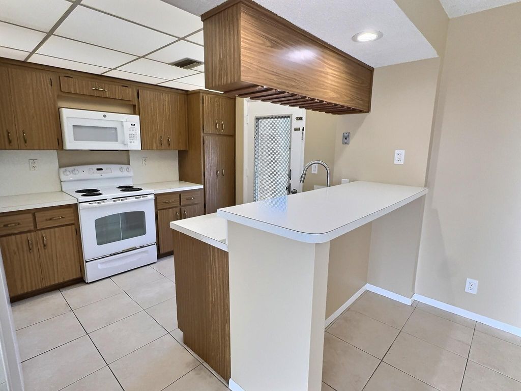 Photo of 9150 NW 38th Drive #306, Coral Springs, FL 33065 (MLS # F10536323)