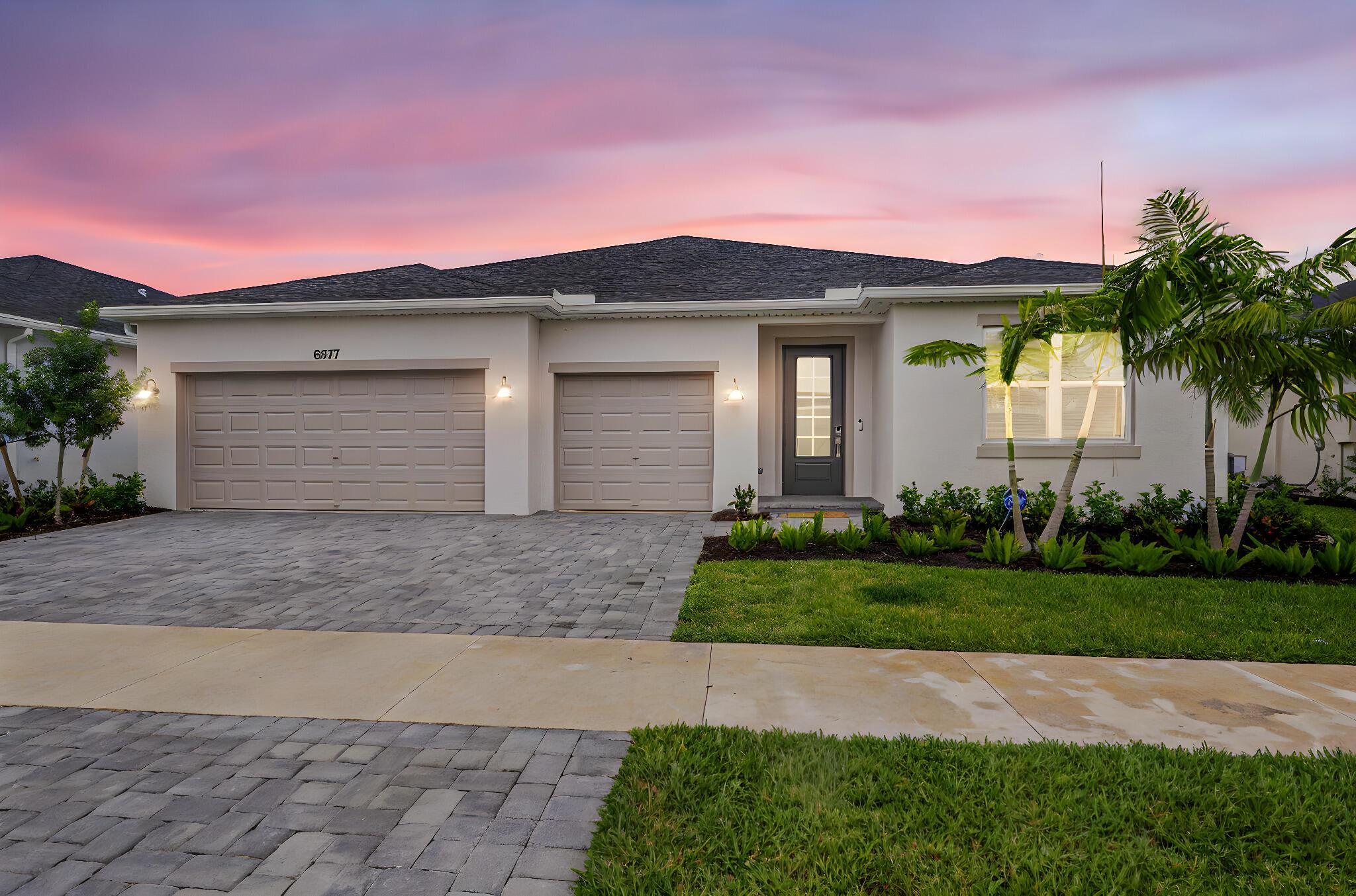 Welcome to Brystol and Wylder. This brand new development is all the excitement. Resort style living with Clubhouse, pickleball, pool, gym, playground, dog park and so much more to come. As soon as you walk in to this Onyx model home with all tile floors you are immediately drawn to the beautiful lake views. This owner has fenced in the yard. Meritage builder has included all impact windows and doors (owner upgraded front door to a door with windows) wall ovens and cooktop, all stainless appliances and washer and dryer in laundry room, 3 car garage with room to park 3 cars in driveway, spray foam insulation for cost effective living and smart home features. Master suite with dual sinks and large walk in shower. and includes a huge walk in closet.