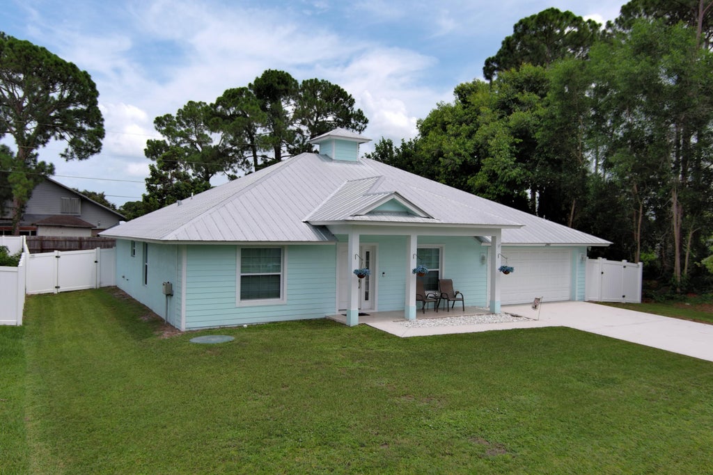 Photo of 2861 SW GIRALDA Street, Port Saint Lucie, FL 34953 (MLS # B26059440)
