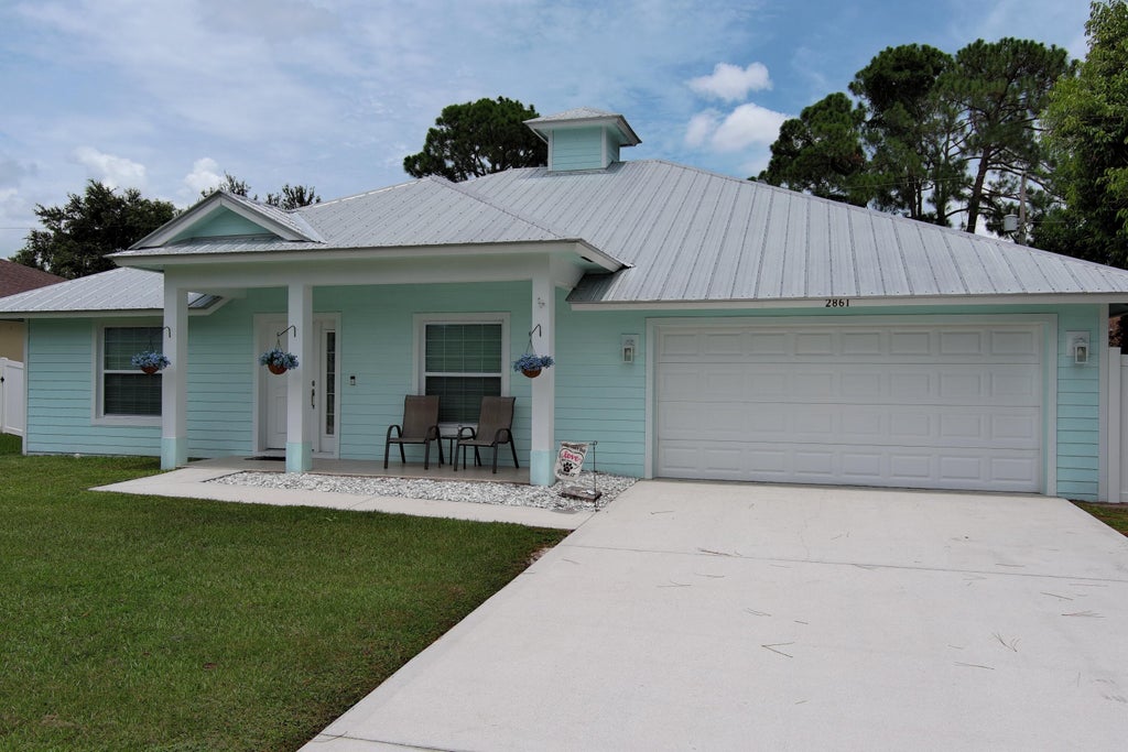 Photo of 2861 SW GIRALDA Street, Port Saint Lucie, FL 34953 (MLS # B26059440)