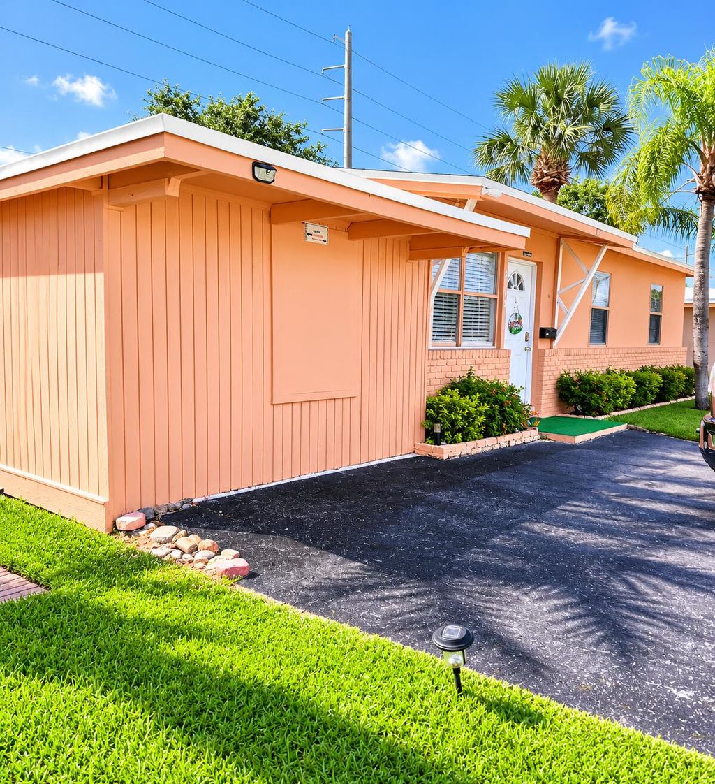 Photo of 2940 Avenue, Riviera Beach, FL 33404 (MLS # B26032159)