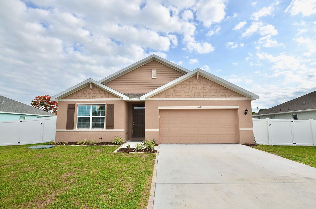 Photo of 1065 SW Mccracken Avenue SW, Port Saint Lucie, FL 34953 (MLS # R10990679)