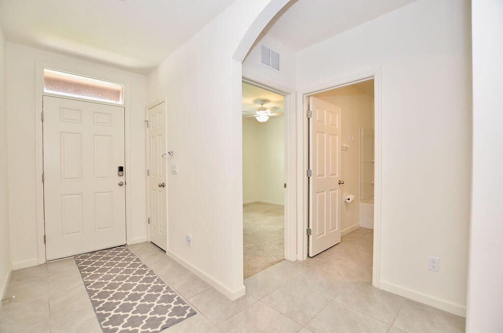 Photo of 1065 SW Mccracken Avenue SW, Port Saint Lucie, FL 34953 (MLS # R10990679)