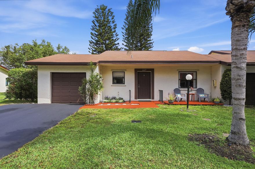 Rarely available 3BR/2BA corner unit villa with the look and feel of a single family home thanks to its expansive, open green space positioning. This light filled layout includes a true split floor plan, a one car garage, and newer stainless steel appliances. The third bedroom functions perfectly as a den/office (no window), giving you space for work or guests.The corner placement makes the yard appear exceptionally large - ideal for relaxing, entertaining, or simply enjoying extra privacy. With strong financing options available, this home is perfect for FHA and VA buyers, purchase with as little as 3% down or even 0% down depending on qualification. Priced to sell and truly a must see, this villa delivers value, space, and opportunity in one of the most desirable layouts you'll find.