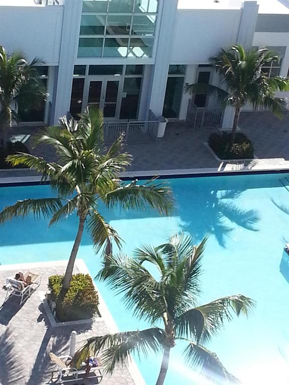 Loft style condo with view of Clear Lake.Split bedroom plan with large master bath.Walking distance to City Place, and downtown West Palm Beach.