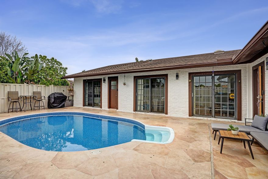 One-Story Living Doesn't Get Better Than This!!! Most Townhouses Give You Walls & Neighbors. This One Gives You A Private Pool Paired w/ A Fully Fenced Outdoor Space, 3 Ample Bedrooms w/ Vaulted Ceilings & Sparkling Pool Views From Each One! Sunshine Beams Through Skylights On A New, Beautifully Updated Kitchen Featuring Custom Finishes That Showcase A Fresh, Designer Inspired Palette! Oversized Primary w/ Xtra Windows & An Ensuite Complete w/ Extended Vanity & Shower/Tub Combo!  New Appliances Including W/D: Toss Your Laundry In Dirty & Comes Out Clean & Dry! Roof '22, New Water Heater! Enjoy Tennis, Pickleball, Racquetball, Basketball, Fitness Room, Scenic Pathways For Jogging/Cycling, Playground Or Socialize At One Of 3 Community Pools! Best Priced w/ Pool In All Of Boca Gardens! Please use all supplements attached when submitting offer