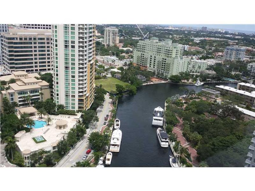 Luxury Las Olas Highrise. Spacious split plan unit situated on the 17th floor w/southern views, partial ocean view, cruise port views & city views. Tiled living areas. Formal dining rm. Granite kitchen w/snack bar. Resort amenities incl a roof top pool,sp a, basketball/racquet ball courts, business ctr,exercise room,water taxi, 24-hr lobby attendant & more. First Time Buyers, complete HomePath Ready Buyer homeownership course & earn up to 3% closing cost assistance. This is a Fannie Mae Homepath  Property!