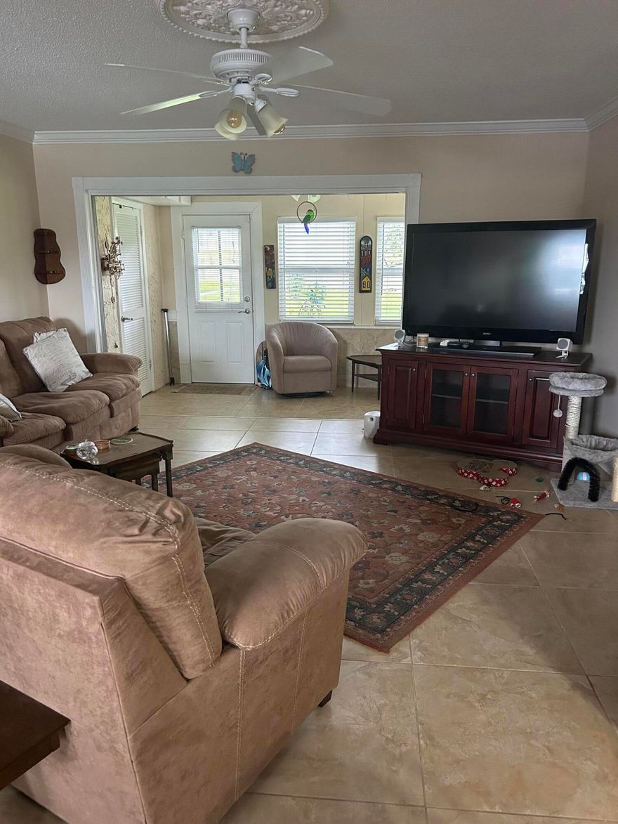 Spacious first floor 1 bedroom 1 bath plus Den Unit in over 55  community with NEW ROOF, updated kitchen and baths.  A/C enclosed patio which is a perfect spot for morning coffee or an evening cocktails.  Parking spot in front of unit plus lots of guest parking available Amenities include pool, fitness center, game room and more. Located minutes to shopping ,restaurants, beaches and PBI Airport