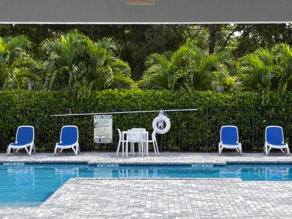 Photo of 4626 MEYERSON Place, Lake Worth, FL 33463 (MLS # B26081209)