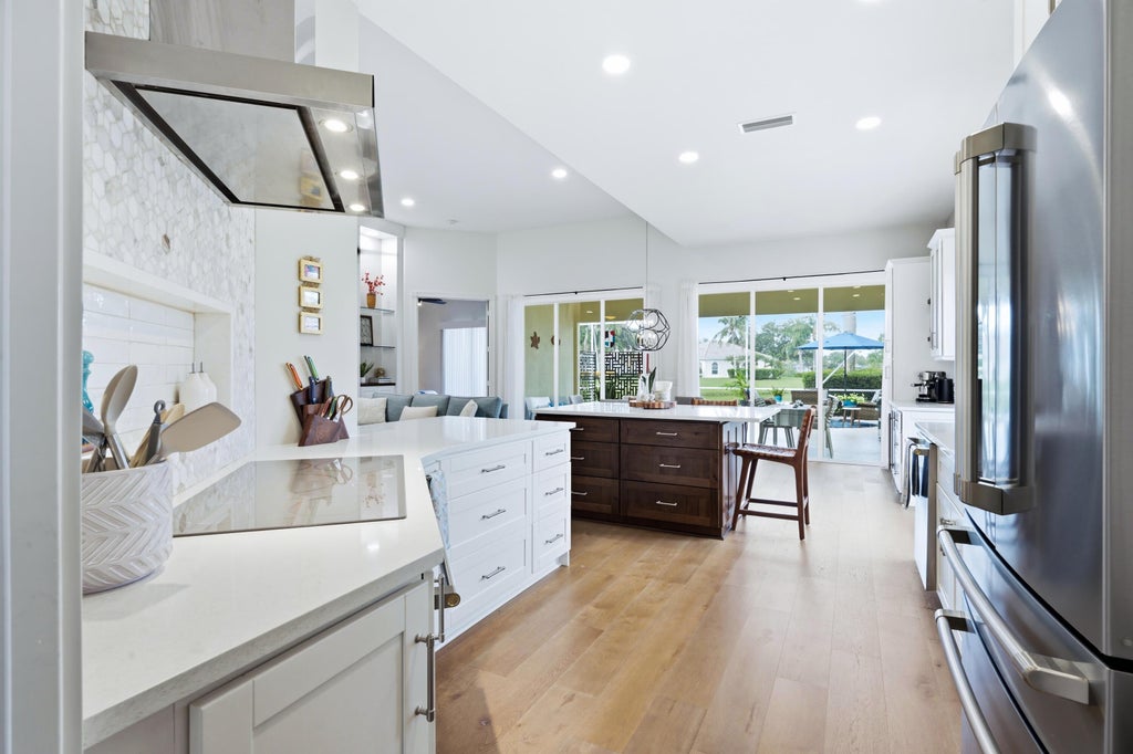 Photo of 1321 Saint Lawrence Drive, Palm Beach Gardens, FL 33410 (MLS # B26052972)