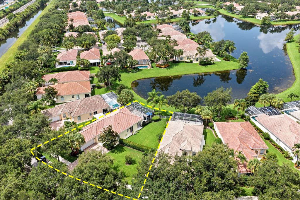 Photo of 1321 Saint Lawrence Drive, Palm Beach Gardens, FL 33410 (MLS # B26052972)