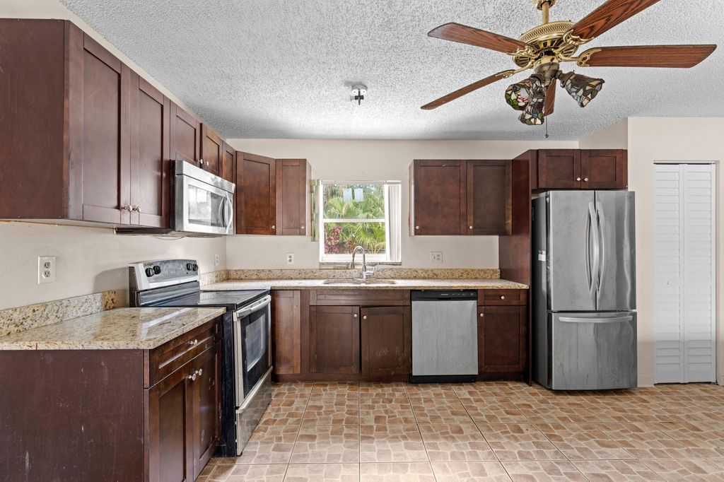 Photo of 5949 Westfall Road, Lake Worth, FL 33463 (MLS # R11161584)
