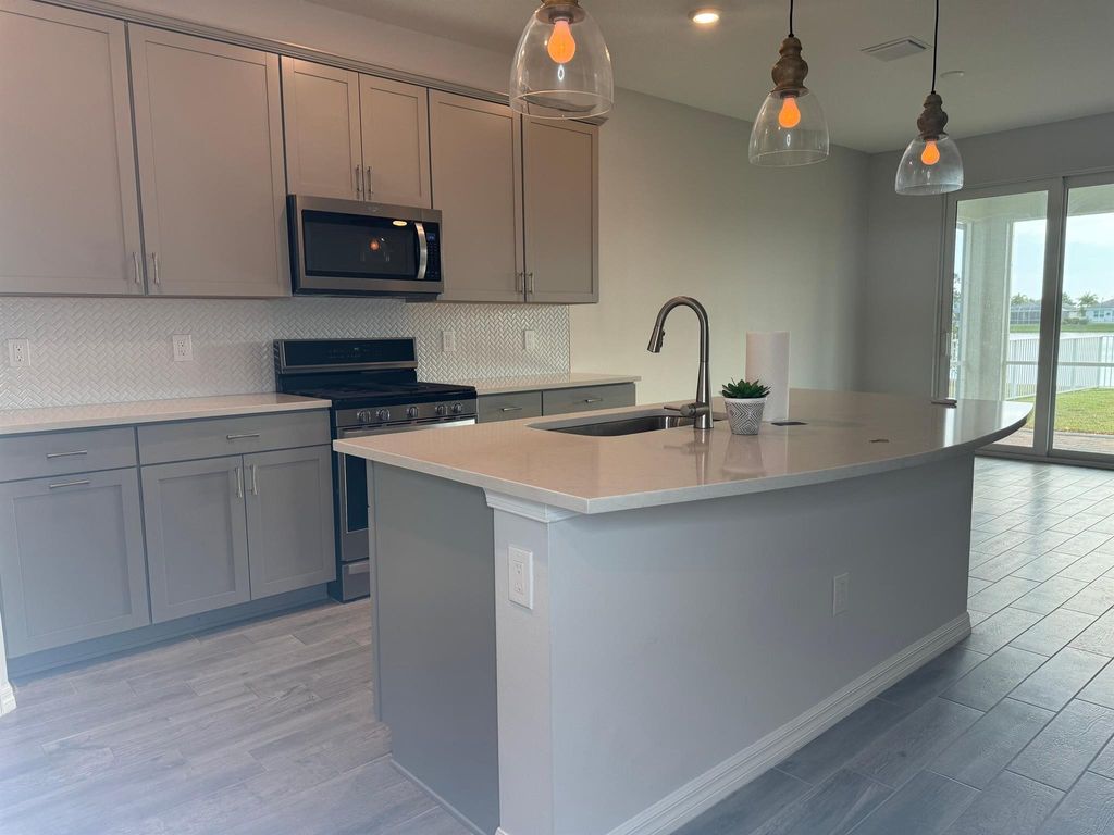 Photo of 10376 SW Captiva Drive, Port Saint Lucie, FL 34987 (MLS # R11050786)