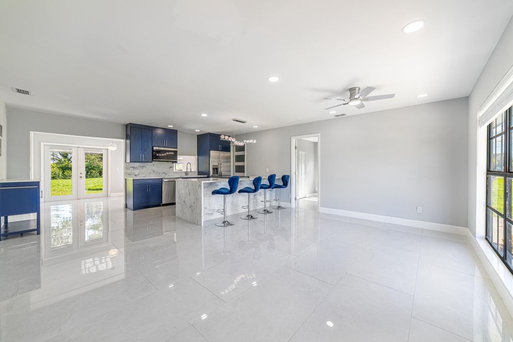 Photo of 1809 SW Capehart Avenue, Port Saint Lucie, FL 34953 (MLS # B26015902)