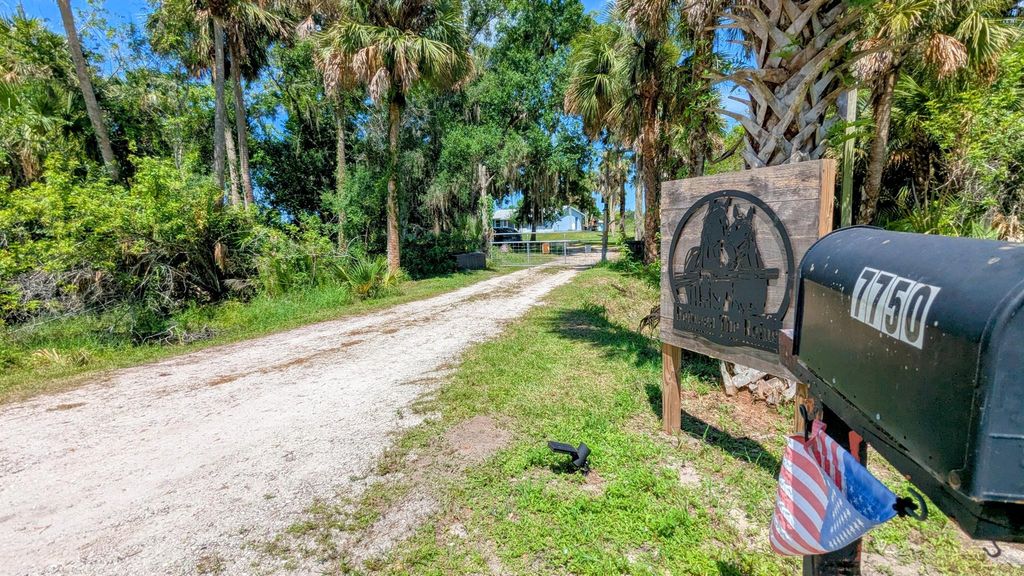 Photo of 7750 Germany Canal Road, Port Saint Lucie, FL 34987 (MLS # R11101426)