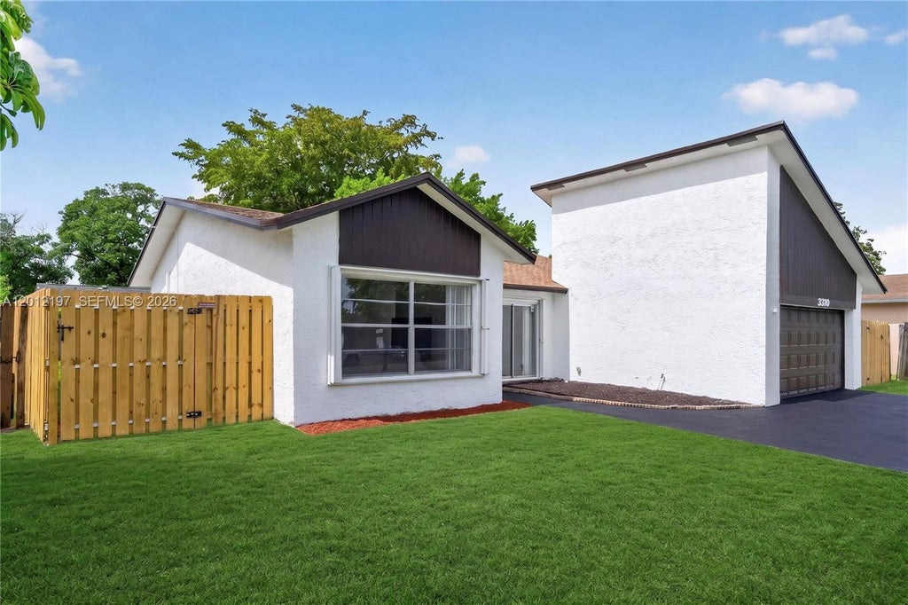 Photo of 8310 NW 48 Street, Lauderhill, FL 33351 (MLS # A12012197)