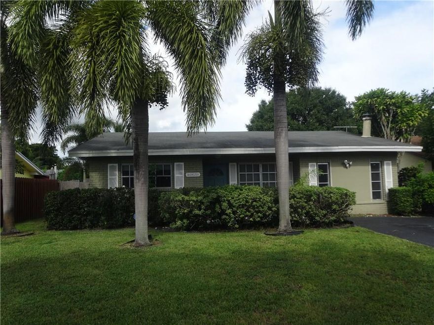 BRIGHT AND AIRY HOME PERFECT FOR ENTERTAINING WITH LOTS OF LIVING SPACE. LARGE KITCHEN WITH BREAKFAST BAR. GORGEOUS CORAL WOOD BURNING FIREPLACE. BEAUTIFULL POOL WITH INTERLOCK PAVER PATIO. HUGE INSIDE LAUNDRY ROOM WITH PULL DOWN STAIRS TO ATTIC STORAGE AREA. HURRICANE SHUTTERS. PLEASE NOTE 3RD BEDROOM/DEN IS USED AS AN OFFICE WITH NO CLOSET SPACE. CONVENIENT LOCATION CLOSE TO TURNPIKE, I-95, SCHOOLS, SHOPPING, RESTAURANTS AND GOLF. HURRICANE SHUTTERS