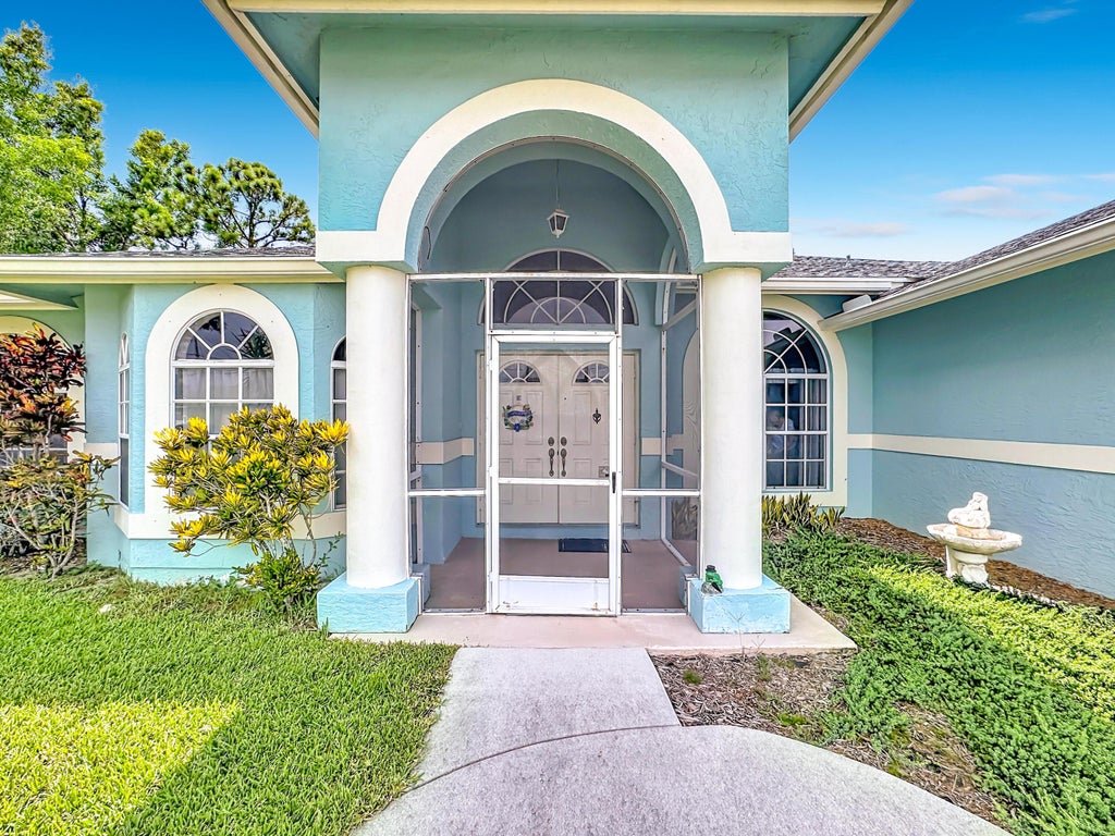 Photo of 497 SE NOME Drive, Port Saint Lucie, FL 34984 (MLS # B26058642)