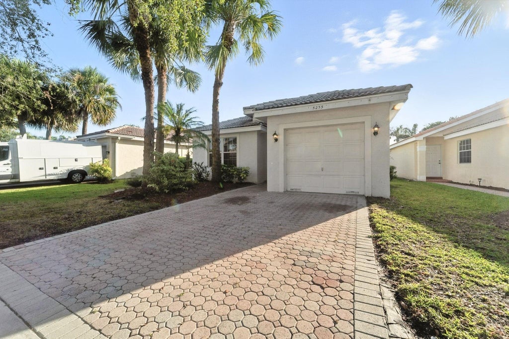 Photo of 5255 NW 117th Avenue, Coral Springs, FL 33076 (MLS # F10516920)
