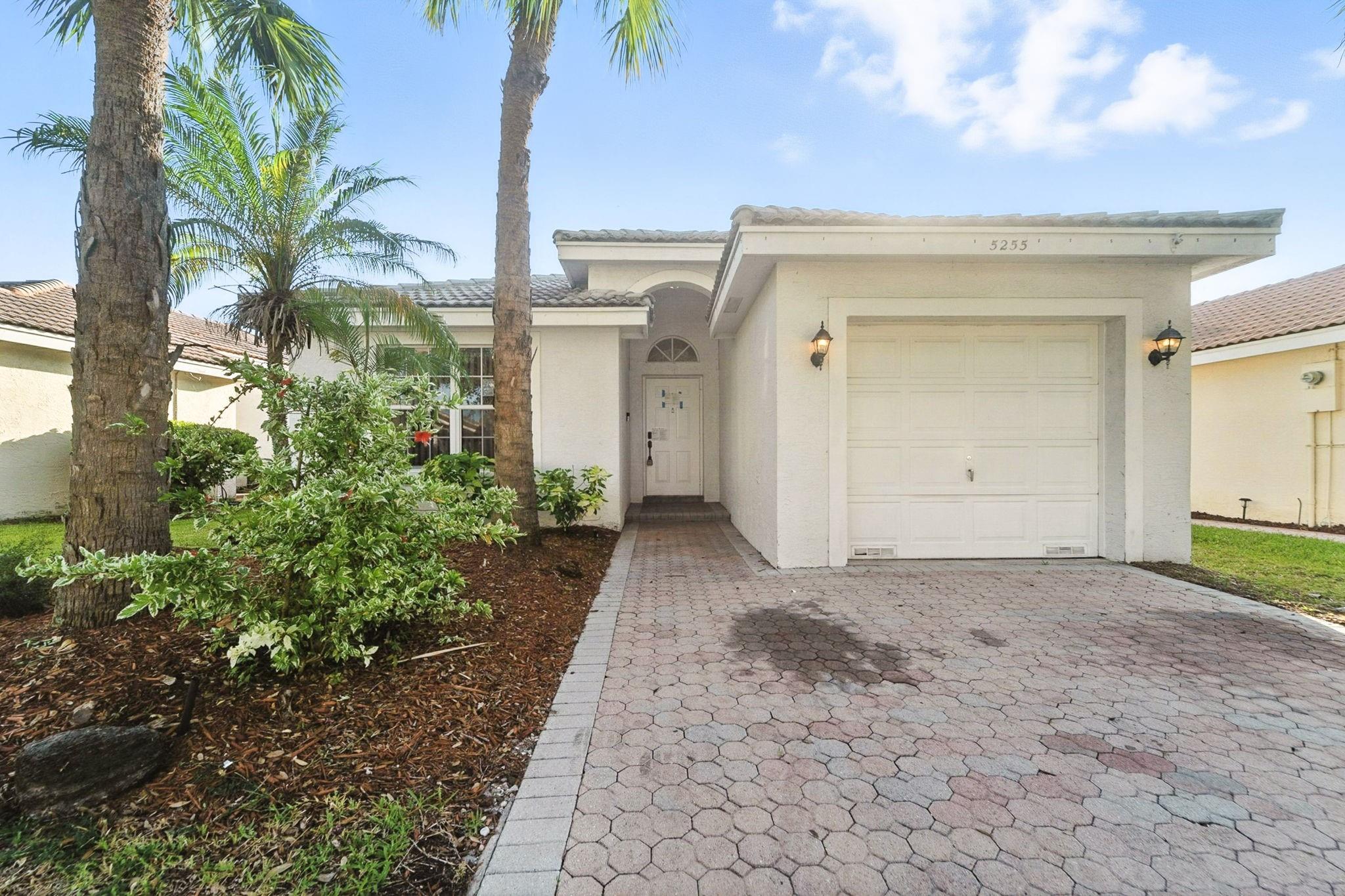 This charming 1-story home features 3 bedrooms, 2 bathrooms, and a 1-car garage. Enjoy an open layout with a kitchen bar perfect for casual dining, stainless steel appliances, and a bright, inviting interior. Step out to the enclosed lanai back porch—ideal for relaxing or entertaining. Schedule a showing today! One or more photo(s) have been virtually staged.