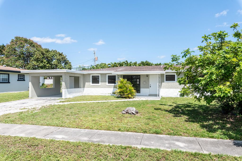 Photo of 1040 Long Island Avenue, Fort Lauderdale, FL 33312 (MLS # R11156427)