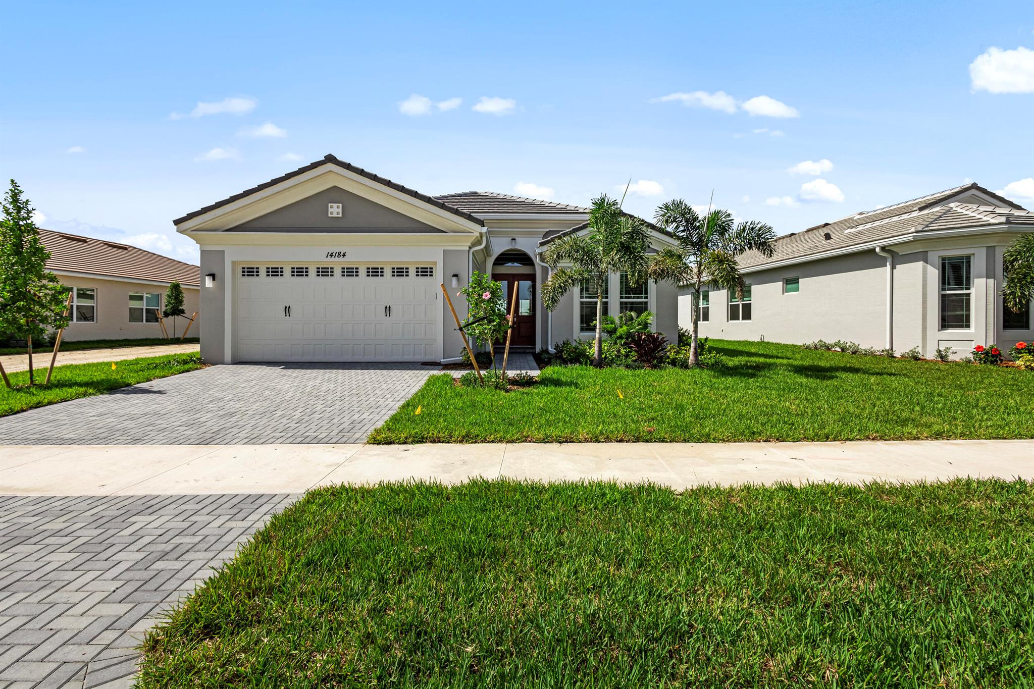 Discover this beautifully maintained **3-bedroom, 3-bathroom home** in the heart of Westlake, FL, where modern comfort meets everyday convenience. Lightly lived in and meticulously cared for, this home showcases elegant tile flooring throughout and an open-concept layout designed for both entertaining and easy living. Sophisticated upgrades elevate each space, while the **2-car garage** provides plenty of storage and functionality.Step outside to your private patio and enjoy peaceful **lake views**--the perfect backdrop for morning coffee or evening relaxation.