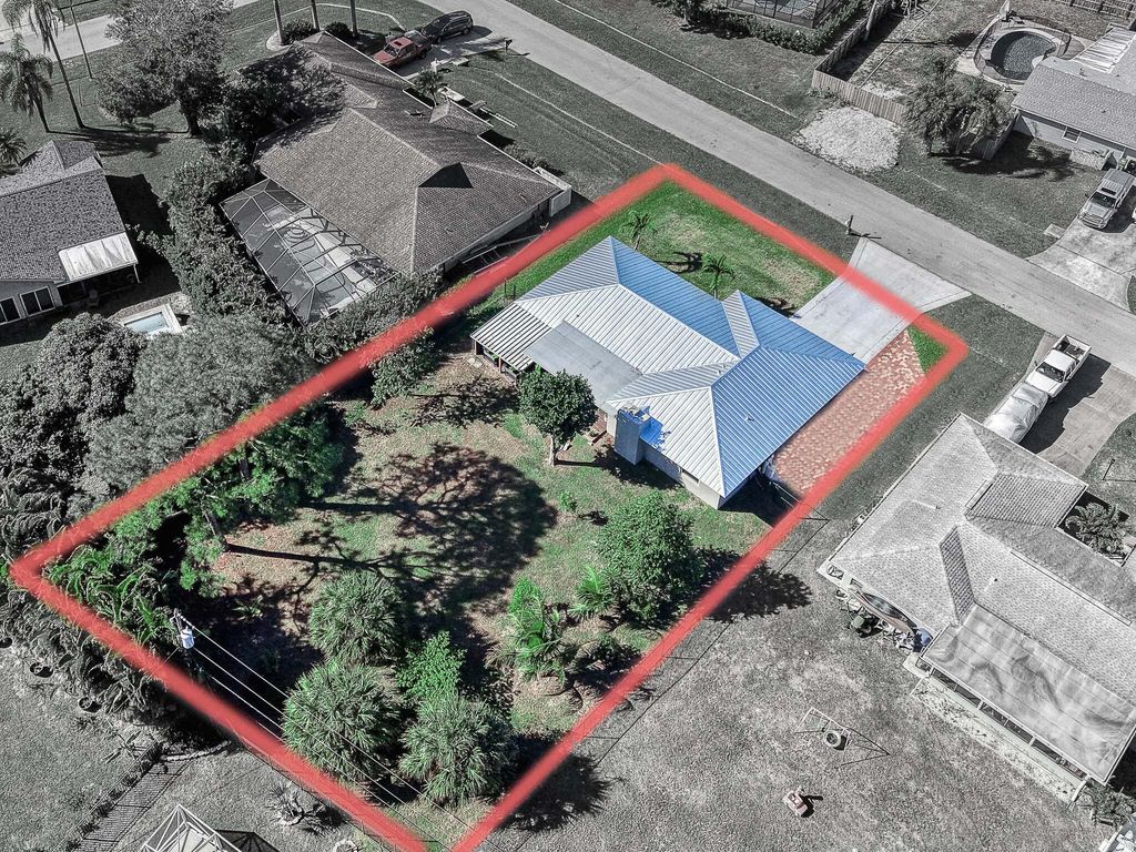 Photo of 2485 SE Saphire Ter, Port Saint Lucie, FL 34952 (MLS # R11155467)