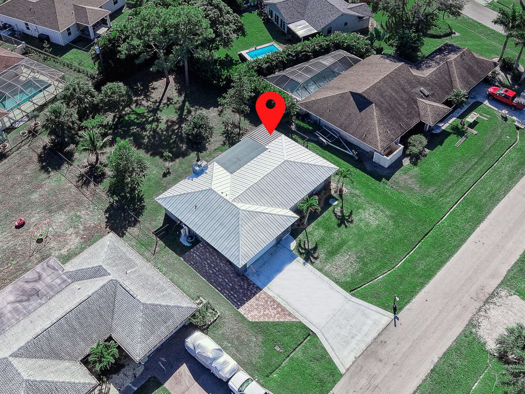 Photo of 2485 SE Saphire Ter, Port Saint Lucie, FL 34952 (MLS # R11155467)