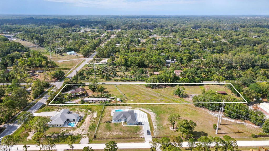 Photo of 12475 Sunset Boulevard, The Acreage, FL 33411 (MLS # R11084987)