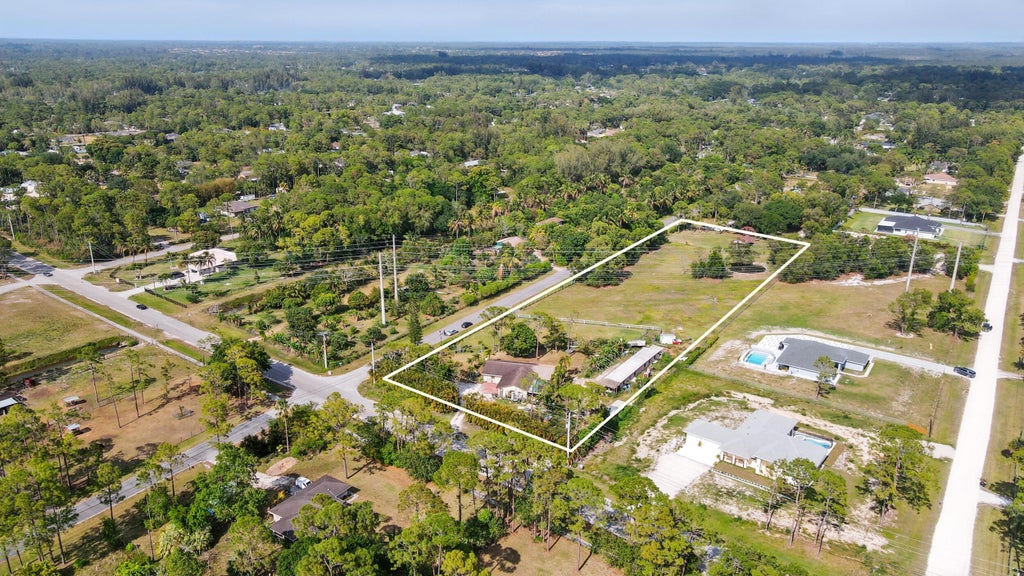 Photo of 12475 Sunset Boulevard, The Acreage, FL 33411 (MLS # R11084987)
