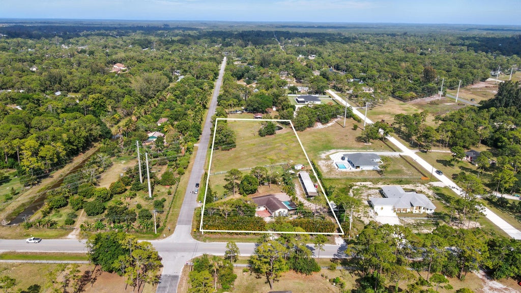 Photo of 12475 Sunset Boulevard, The Acreage, FL 33411 (MLS # R11084987)