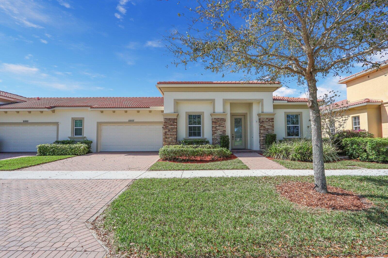 Located in the sought-after PGA Verano community, this move-in ready 2BR/2BA +Den/Office home feels like new and showcases many tasteful and thoughtfully selected upgrades throughout. Enjoy crown molding, recessed high-hat lighting, and a stunning designer kitchen with new Samsung stainless appliances, waterfall quartz countertops, pendant lighting, and full-height glass backsplash. Custom California Closets in all closets and pantry. Freshly painted interior, upgraded garage with epoxy flooring and space for your golf cart. Primary suite offers dual sinks, walk-in shower & Roman soaking tub.. Enjoy sunsets from the screened patio with C-24 Canal views. Lake view in front, near dog park, and easy access to entry gate. Double insulation in attic/garage adds energy efficiency. A must-see!